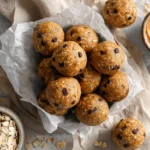 Overhead view of peanut butter protein balls with oats and chocolate chips