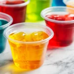 Colorful vodka jello shots in plastic cups – easy jello shot recipe for students