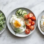 High-protein breakfasts for Ozempic users including Greek yogurt parfait, egg-white omelet, and avocado toast with cottage cheese on a bright table
