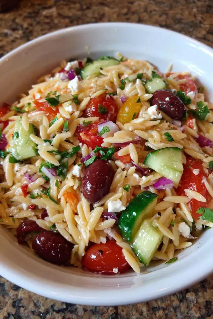 Easy Mediterranean Orzo Pasta Salad (Cheap, Healthy & Perfect for Students!) 4 aminehoussine Easy Mediterranean Orzo Pasta Salad ar 23 v d47e5c9d b863 4f3e 8308 da1b07a544a9 2
