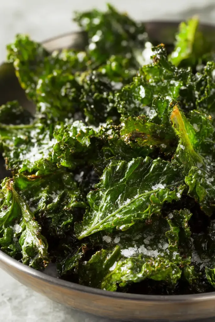 Salt and vinegar kale chips recipe made with fresh kale, apple cider vinegar, and sea salt, baked until crispy