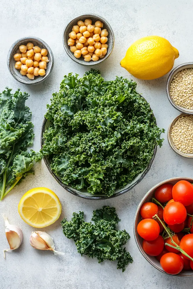 Easy Kale Quinoa Salad with Lemon Vinaigrette (High-Protein & Fresh) 2 Ingredients for kale quinoa salad including kale, quinoa, chickpeas, lemon, olive oil, and fresh vegetables