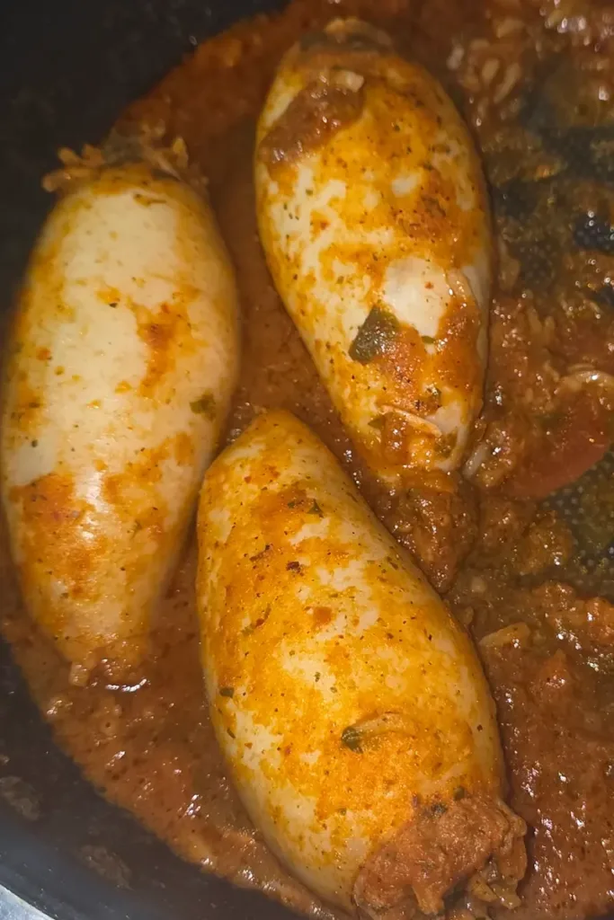 Stuffed Squid Simmering in Tomato Sauce