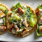 Chicken Caesar Smash Tacos with crispy tortillas, romaine lettuce, Caesar dressing, Parmesan, and crushed croutons